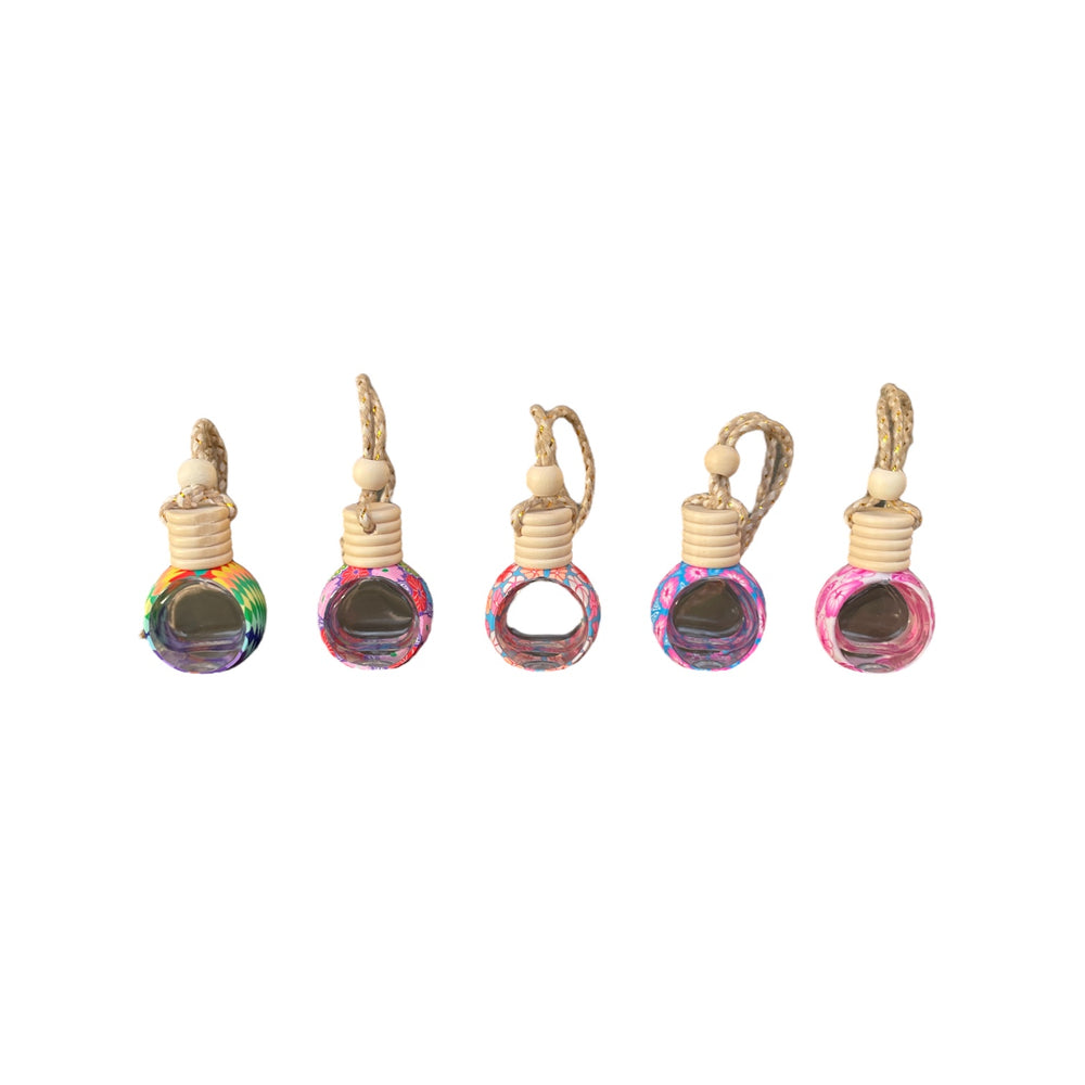 
                  
                    Rainbow Blooms Hanging Car Diffusers $15.00 no oil $27.95 with oil
                  
                